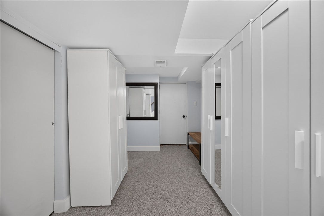 Lower Level (22x10), this part leading to utility room, garage and storage