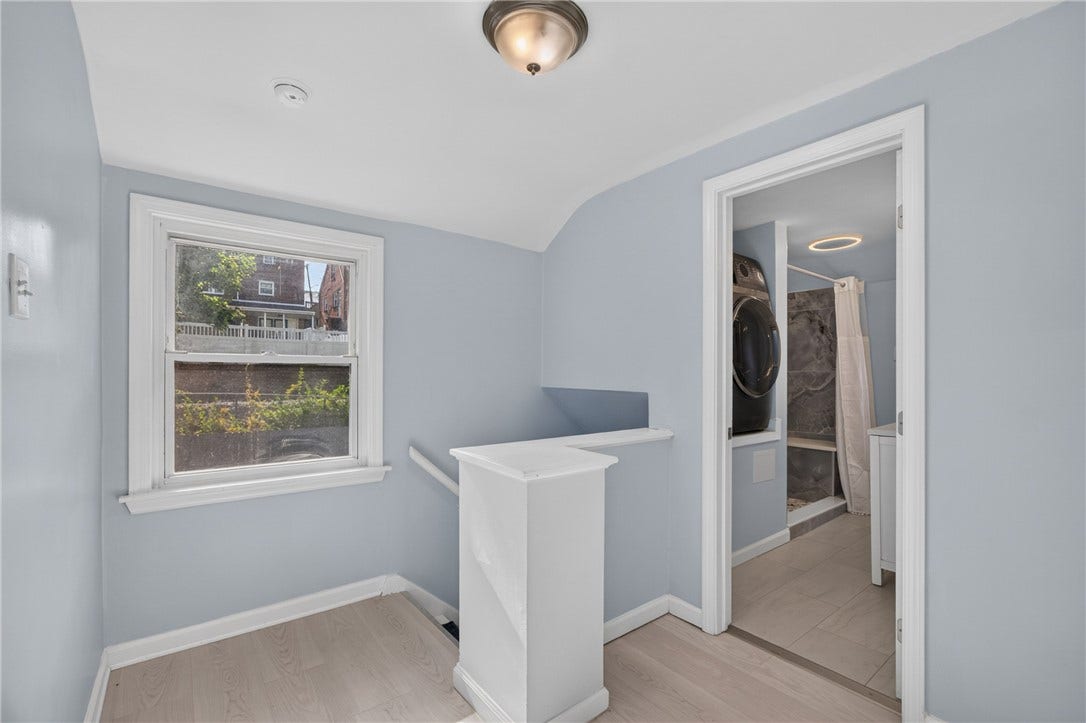 Landing at the top of the stairs leading to bedrooms & hall bathroom