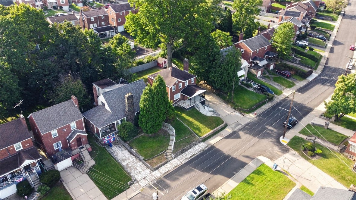 Above and front of homes and street