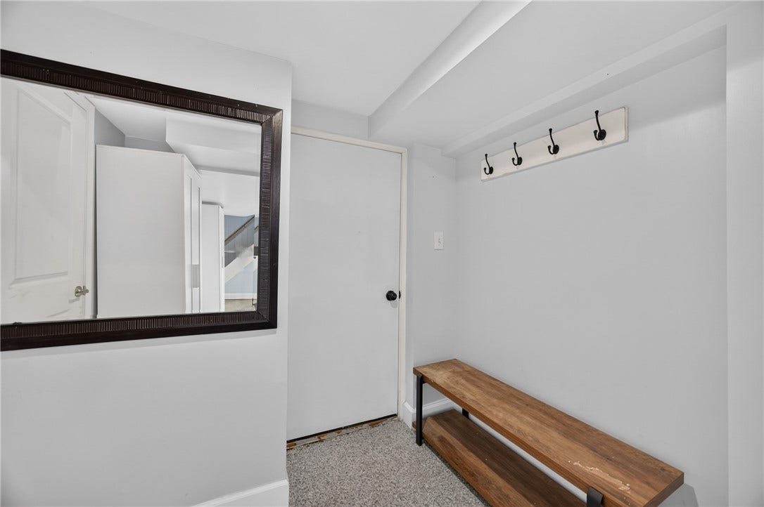 Mudroom area storage just inside garage