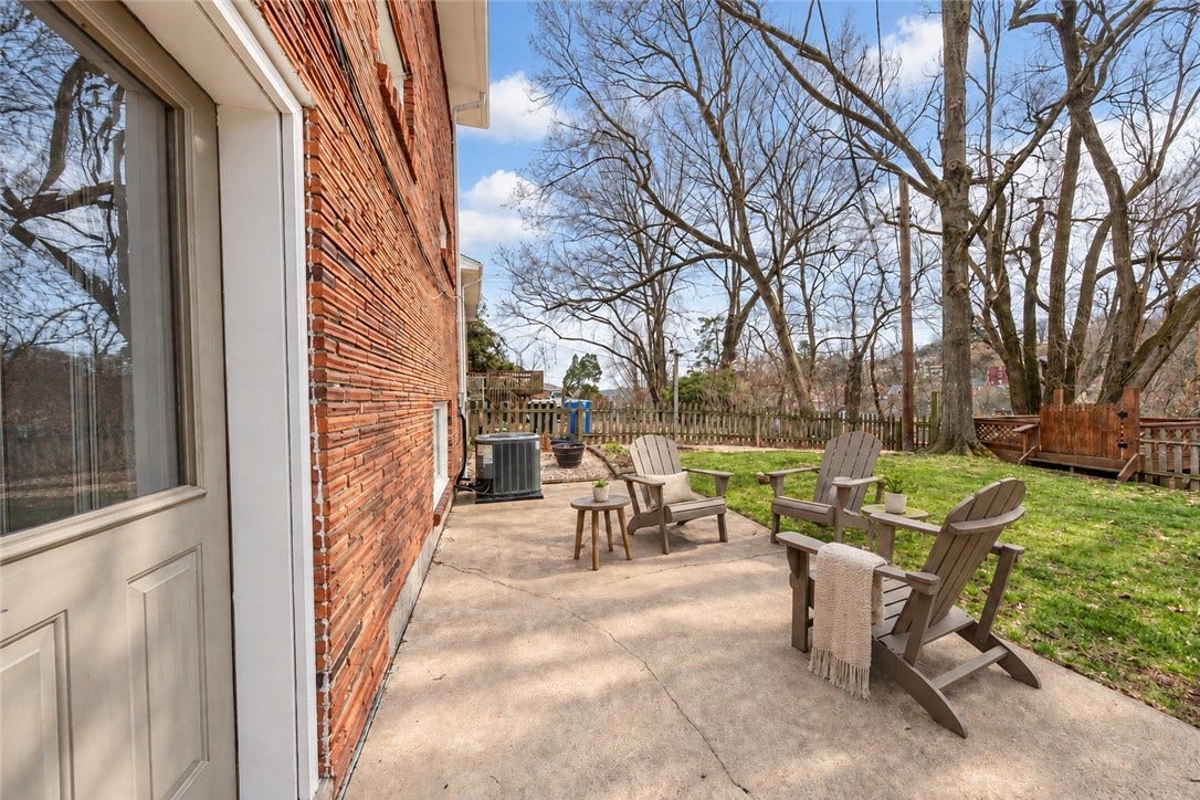 Take your morning coffee outdoors to the spacious back patio.