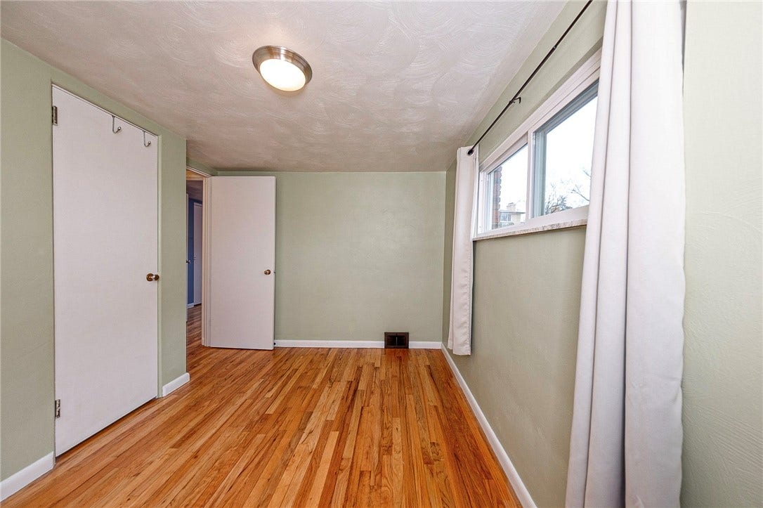 4th bedroom, located on the middle level.