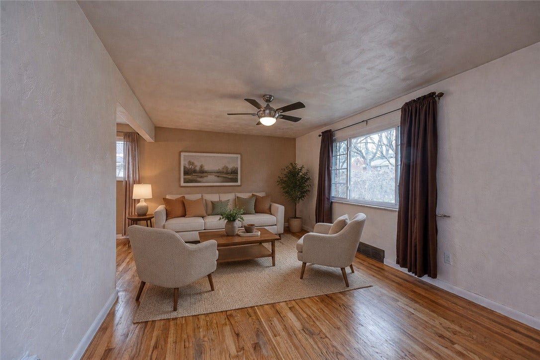 Exposed hardwood floors add warmth and character.