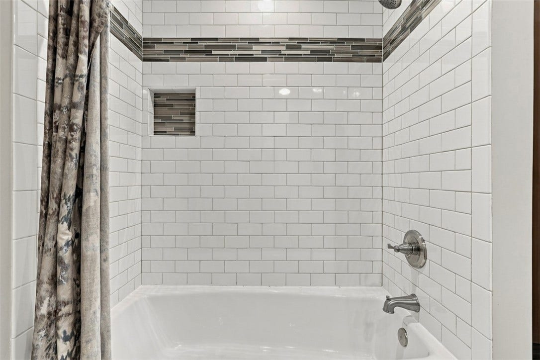 Full bath shower on main floor