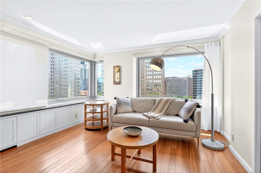 320 Fort Duquesne Blvd, #12L, Pittsburgh, PA 15222 Living Room with views of the City behind.