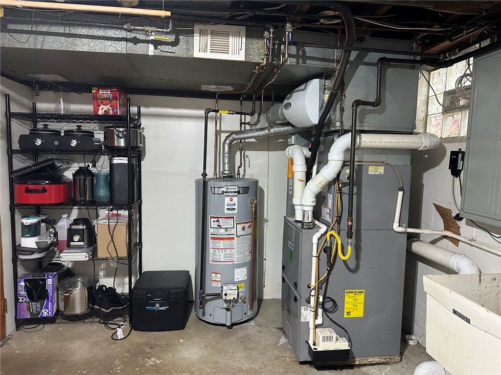 laundry room with storage