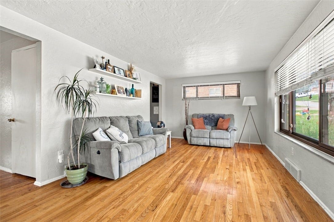 Spacious living room with abundant natural light