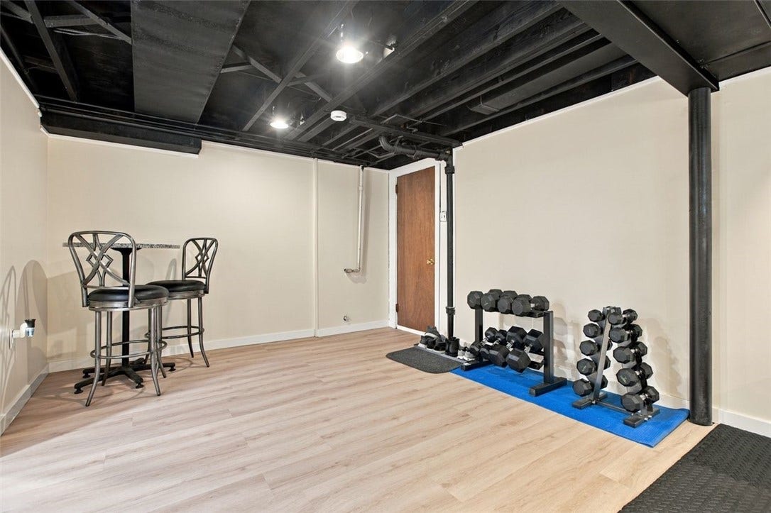 Totally finished gameroom could be an office, entertaining room, or gym