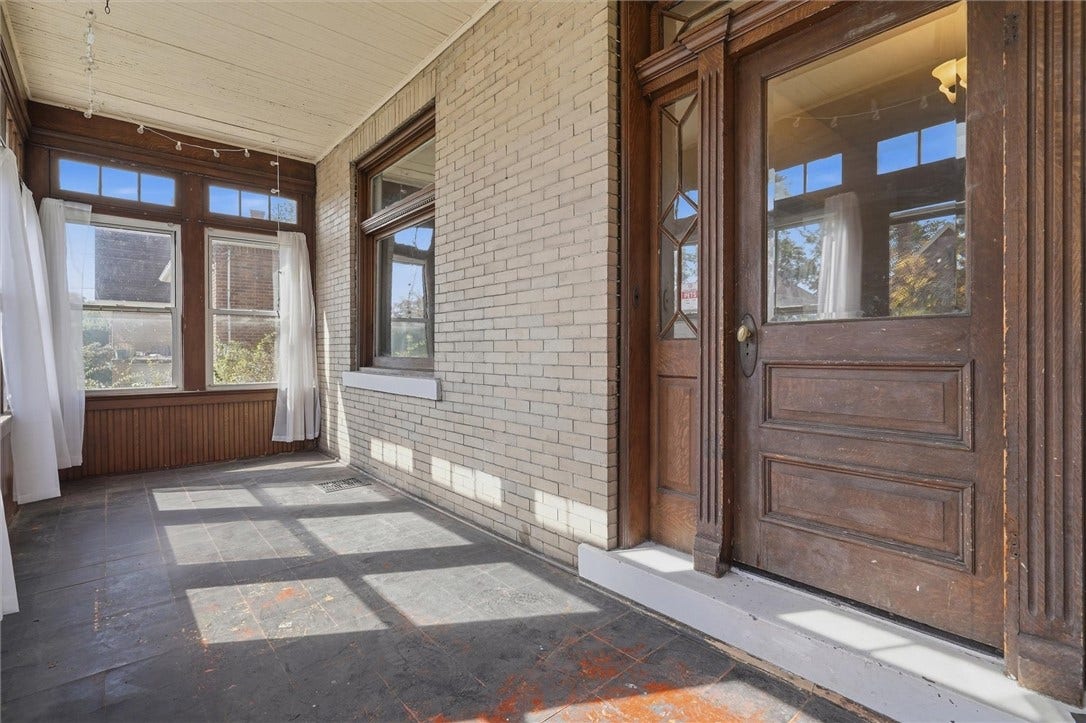 Closed in front porch