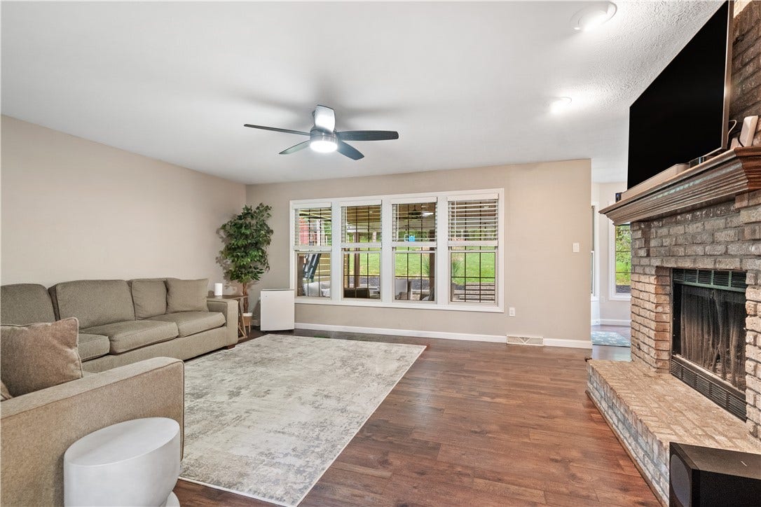The brick fireplace can keep you cozy...