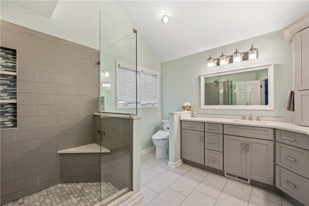 WOW - this custom full primary en-suite!!