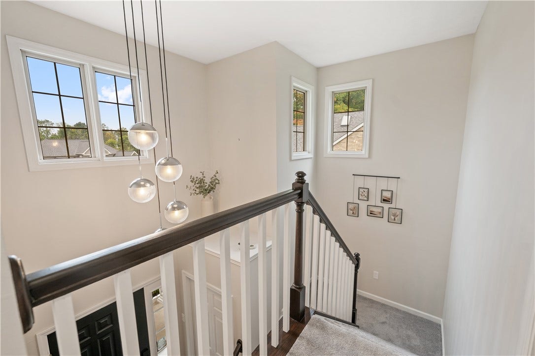 The two-story staircase makes a statement...
