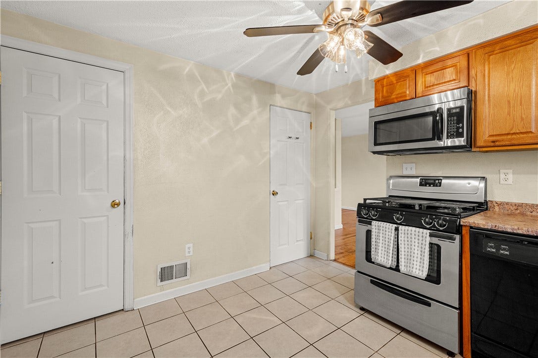 329 Macassar Dr, Pittsburgh, PA 15236 kitchen pantry and door to basement