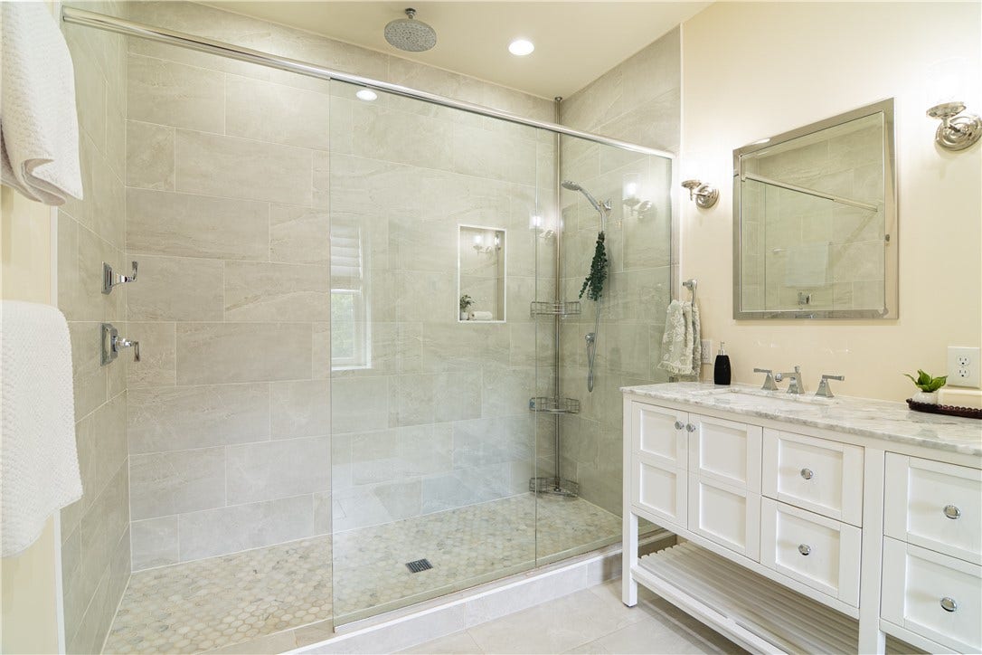Spa like bathroom with heated floors and a shower big enough to have a dance party!
