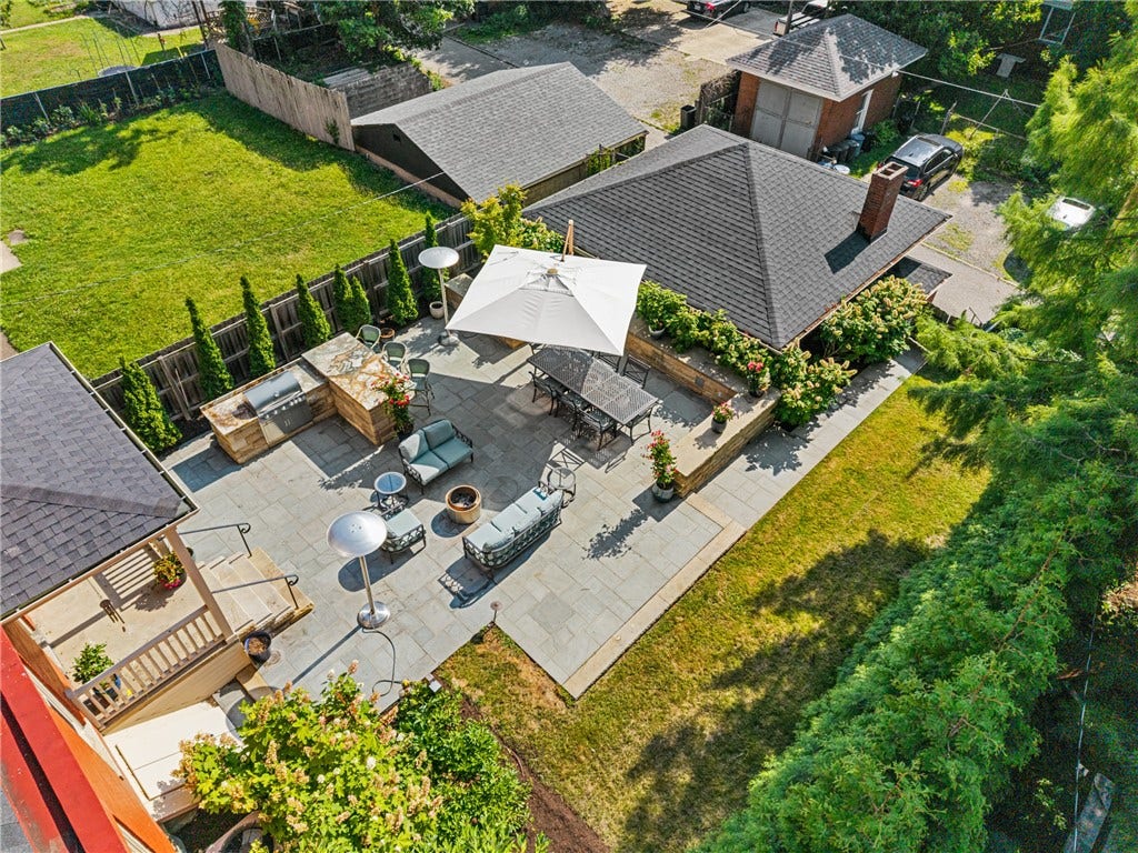 The only proper way to showcase this huge patio is from the air. The back yard is a dream