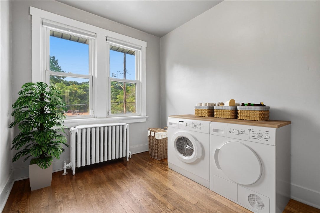 731 S BRADDOCK AVE, Pittsburgh, PA 15221 This bonus space could be made into a second floor laundry by adding a washer and dryer, as the hookups are already in place. WASHER & DRYER ARE CGI.
