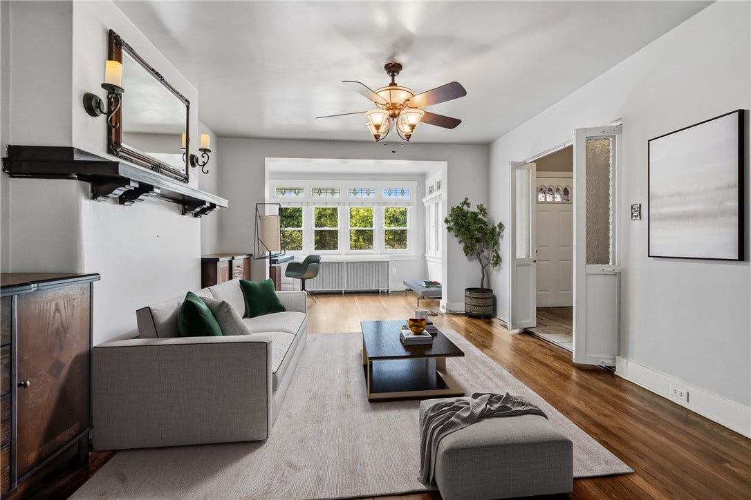 731 S BRADDOCK AVE, Pittsburgh, PA 15221 The living room is digitally staged.