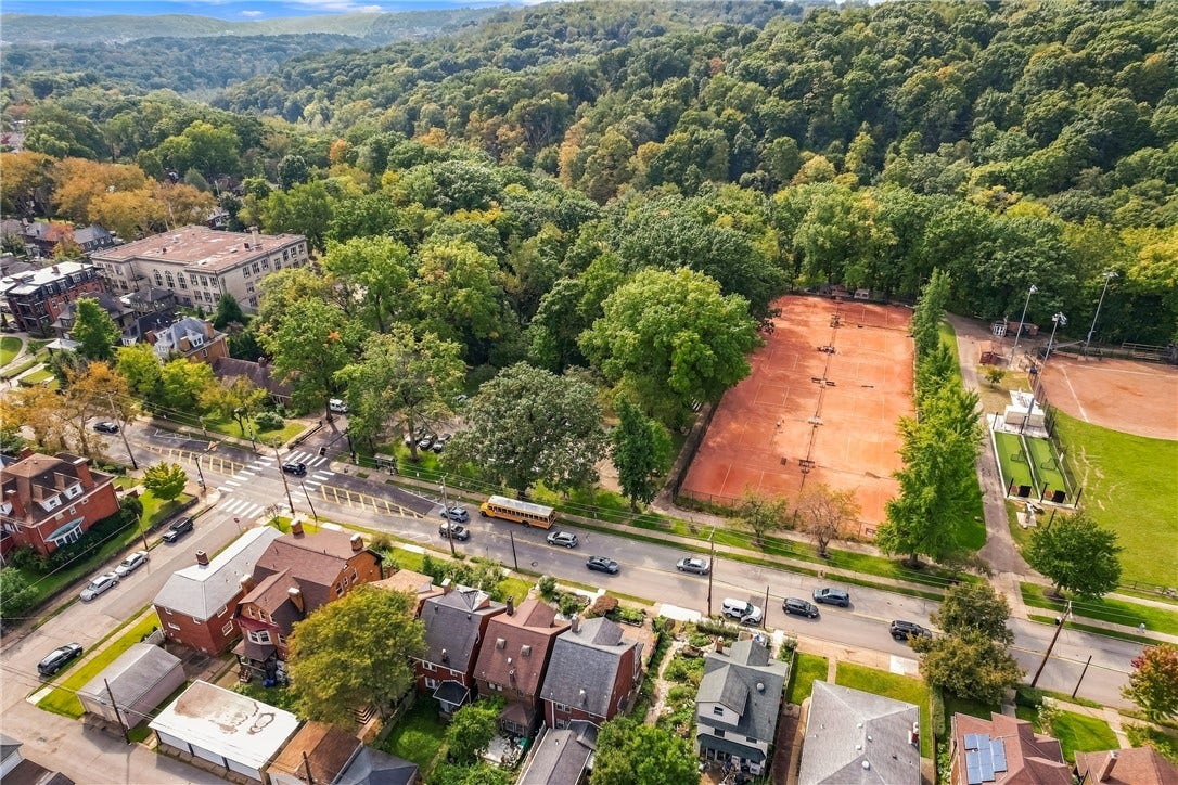 731 S BRADDOCK AVE, Pittsburgh, PA 15221 Directly across the street from Frick Park! Convenient and easy access to the clay tennis courts, playground, and ball field.