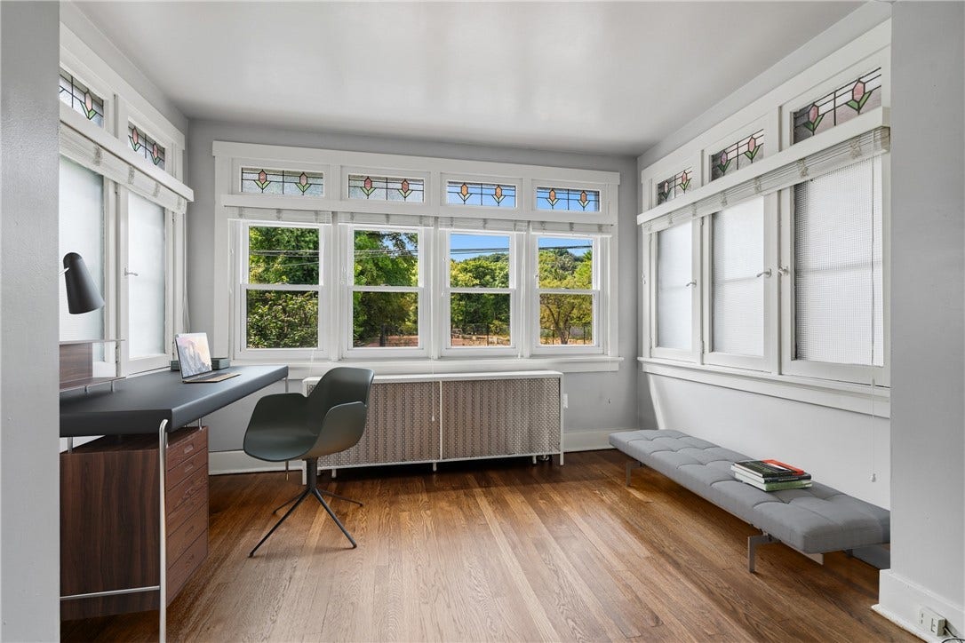 731 S BRADDOCK AVE, Pittsburgh, PA 15221 Sun room is digitally staged as a home office.