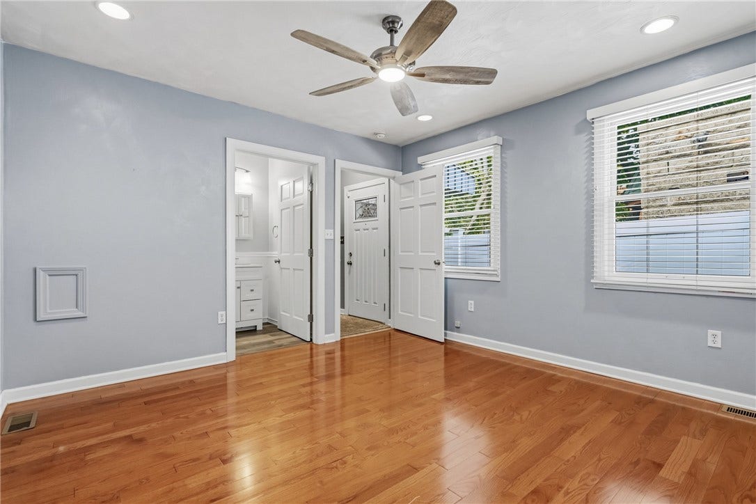 731 S BRADDOCK AVE, Pittsburgh, PA 15221 First floor primary bedroom with ensuite full bathroom