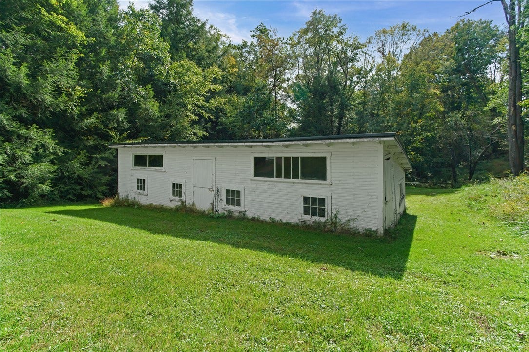 Three stall horse barn (will convey as-is)