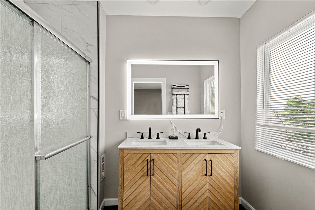 214 N Aiken Ave, Pittsburgh, PA 15206 Updated full bath with glass-enclosed shower