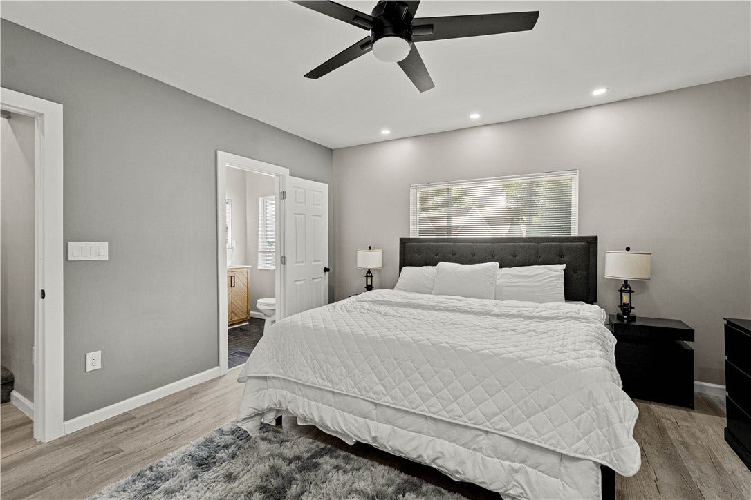 214 N Aiken Ave, Pittsburgh, PA 15206 Second-floor bedroom with ensuite bathj, ceiling fan and recessed lighting
