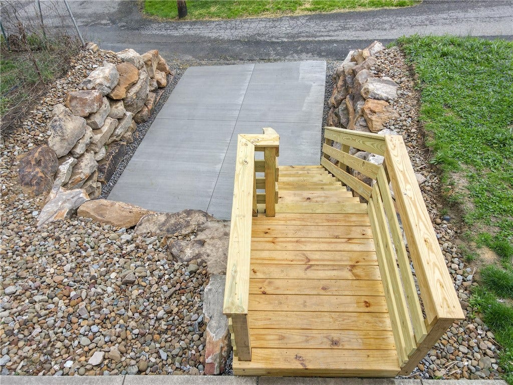 75 Kendall Ave, Pittsburgh, PA 15202 Solid hardscape retaining wall with new pad + EV charger!
