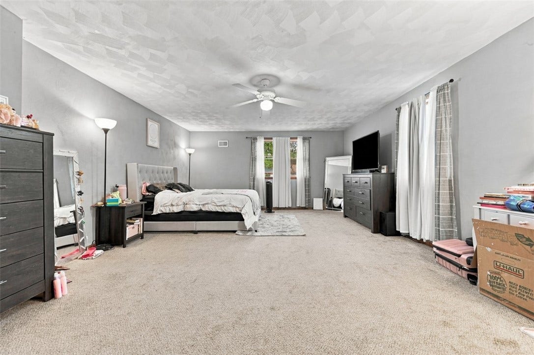 Talk about room to spread out- this extra-large primary bedroom is one of the biggest you'll see, plenty of space to create your own relaxing retreat!