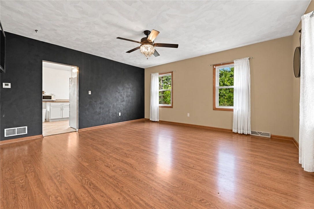Tenant is in the middle of moving out so here is a look at the living room empty. Many ways to arrange all of your furniture! Virtual photo