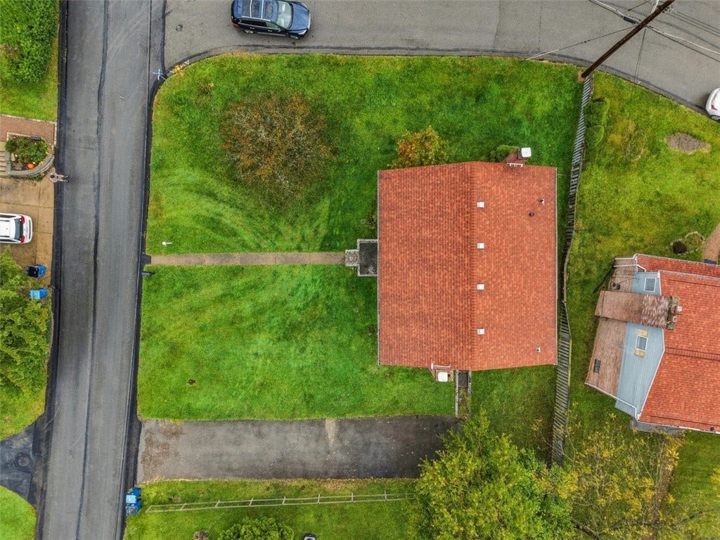 A bird's-eye view of this great corner lot, plus a newer roof for added peace of mind!