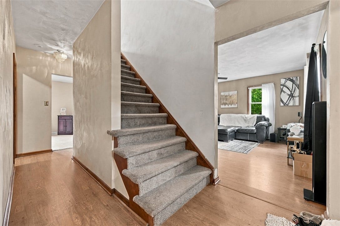 Entry has beautiful floors that easily flows into the main living spaces.