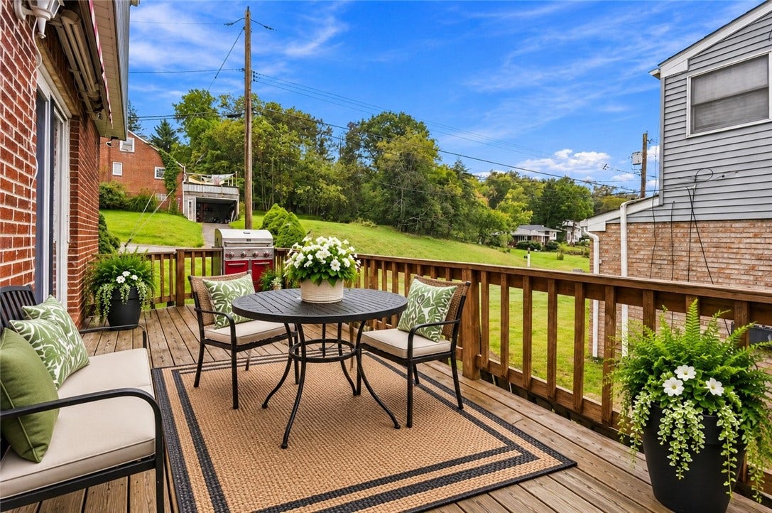 Step outside and unwind on the spacious deck-perfect for morning coffee, grilling out, or relaxing! Virtual staging