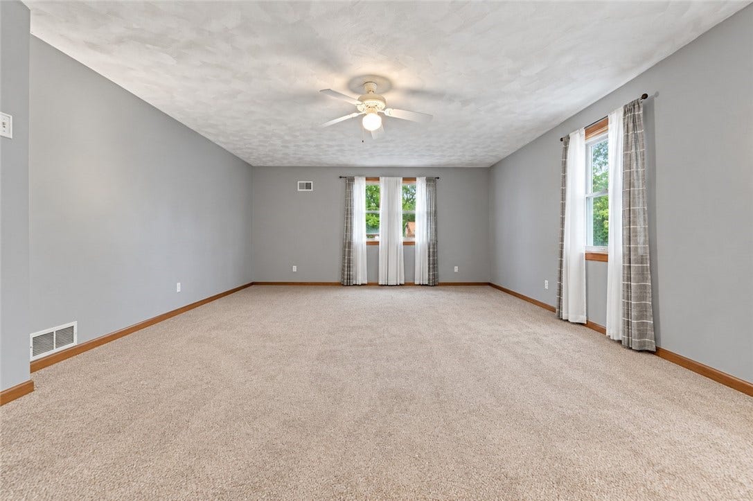 Tenant is in the middle of moving out so here is a look at the primary bedroom empty. Virtual photo