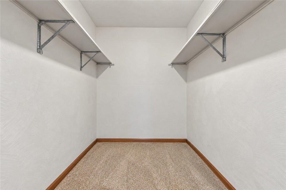 You will love having this wonderfully large walk-in closet right in your primary bedroom! Virtual photo