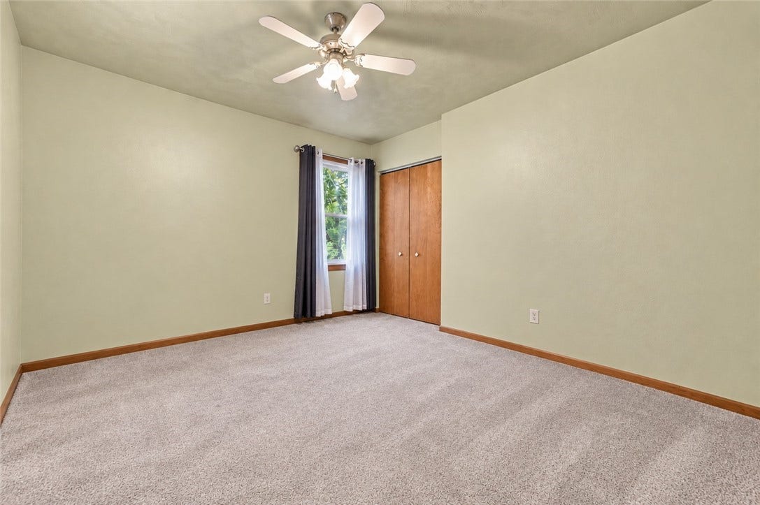 Tenant is in the middle of moving out so here is a look at the 1st floor additional room empty. Virtual photo