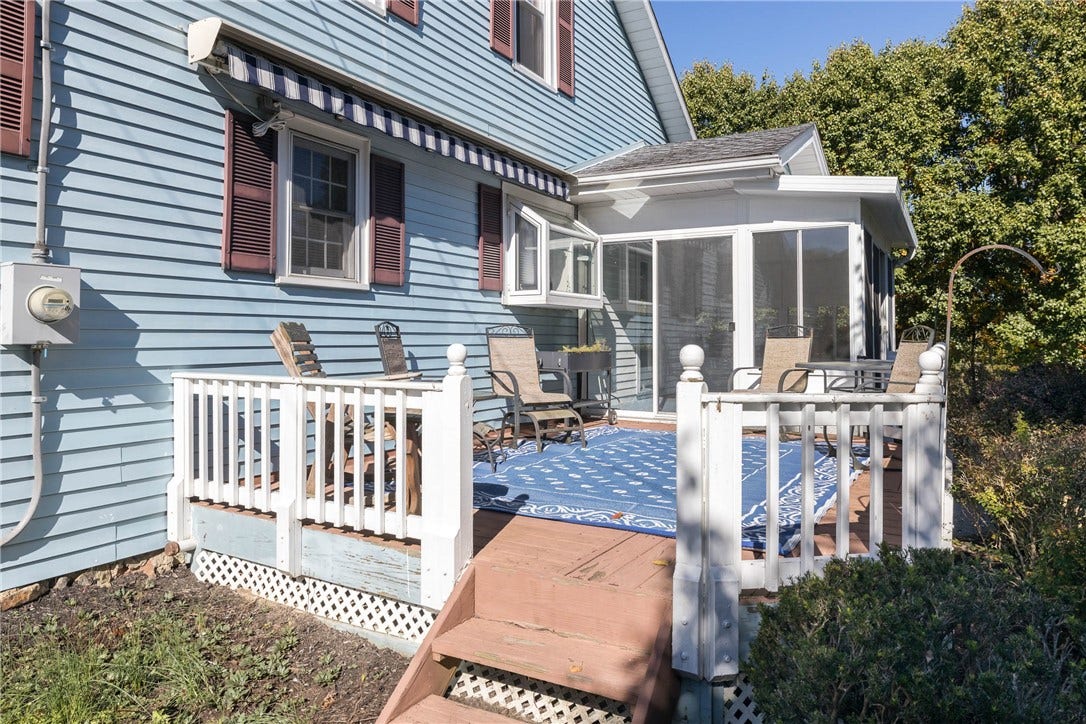 8'10" X 7'8" DECK WITH RETRACTABLE AWNING FOR YOUR CONVENIENCE