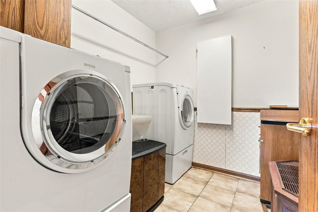 4282 Forest Glen Dr, Allison Park, PA 15101 The laundry room is located conveniently on the upper level