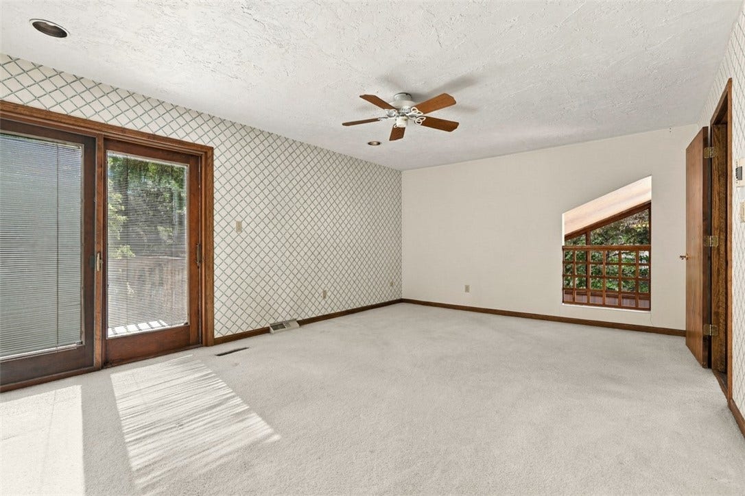 4282 Forest Glen Dr, Allison Park, PA 15101 The sliding glass doors lead to a private balcony and the cutout on the front wall overlooks the living room below.