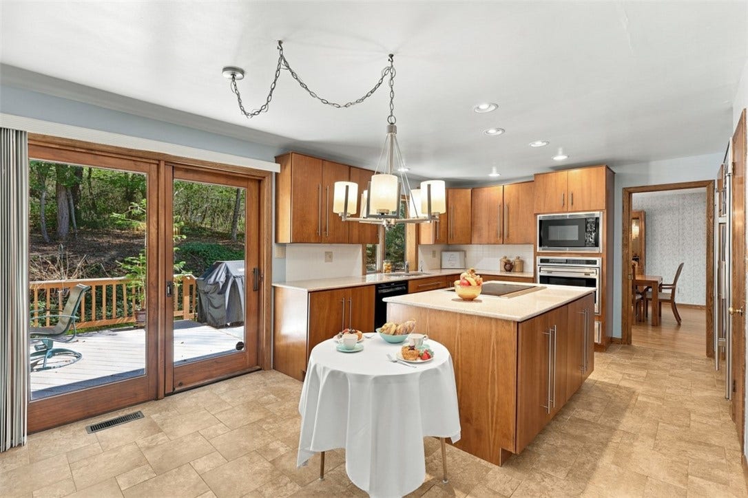 4282 Forest Glen Dr, Allison Park, PA 15101 From the eat in kitchen, you can access the deck and the back yard.