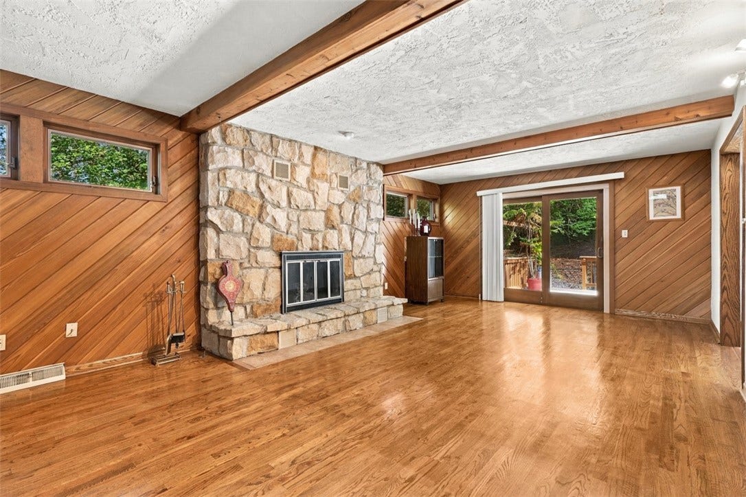 4282 Forest Glen Dr, Allison Park, PA 15101 The deck can also be accessed from the family room and note the diagonal wood and wood beamed ceiling.