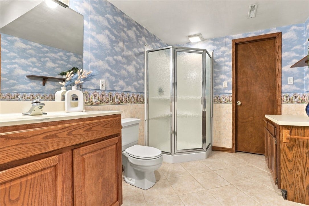 4282 Forest Glen Dr, Allison Park, PA 15101 The 3rd full bathroom is located in the lower level. The door leads you to even more storage space!