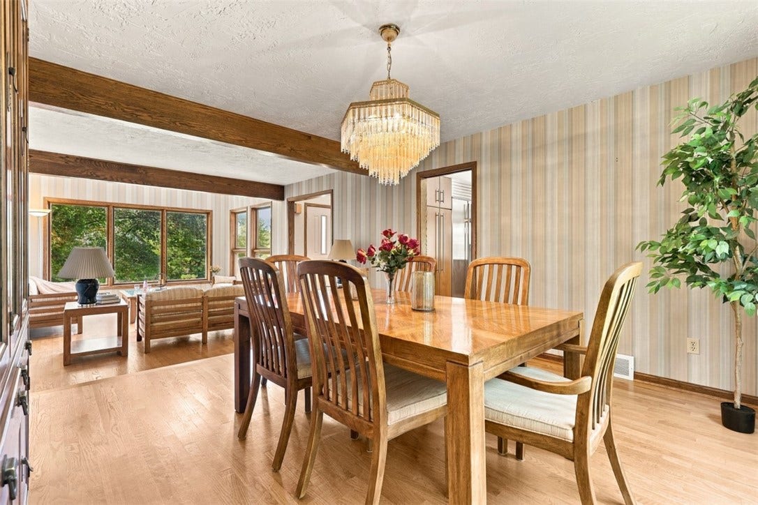 4282 Forest Glen Dr, Allison Park, PA 15101 The dining room is between the living room and the kitchen.