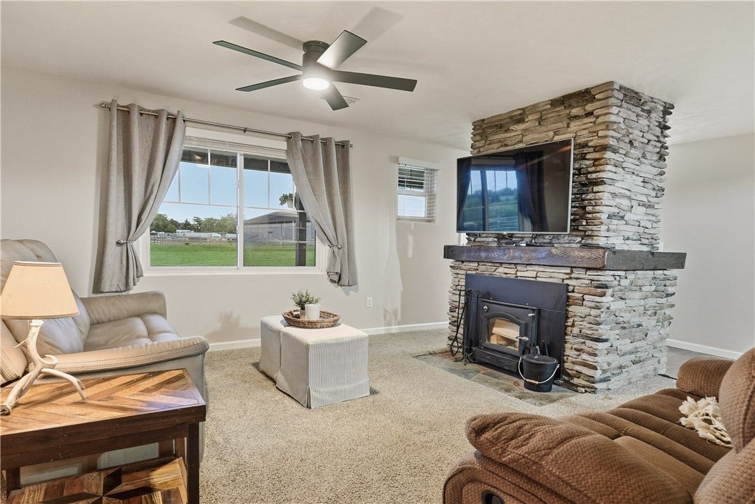 Bright Living Room with large window and great view!