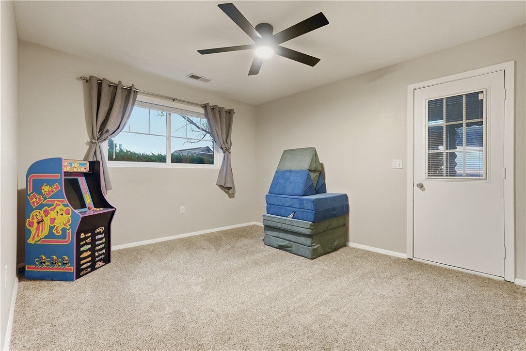 BR2 on 1st floor. Could also be used as a home office, nursery, playroom, hobby room, etc.  Door to Sunroom.