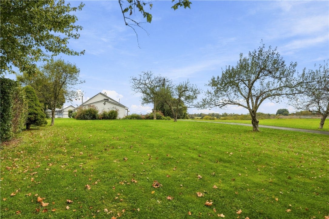 House sits far back fromf road
