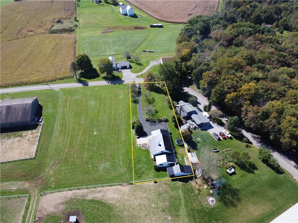 Flat usable half acre yard!