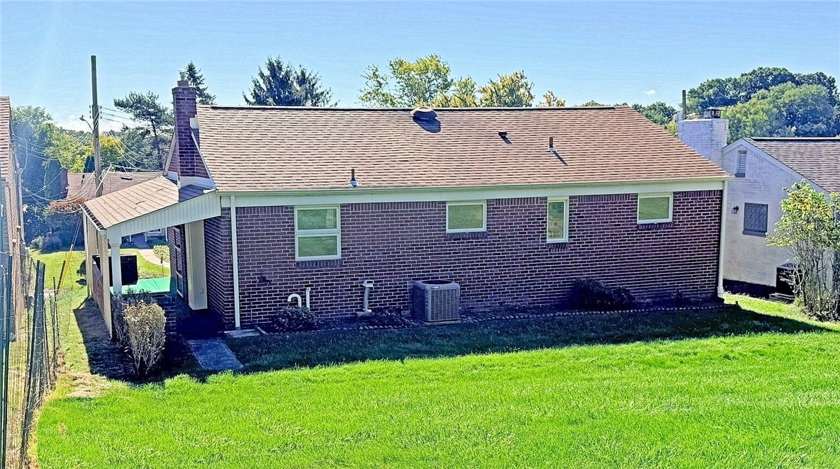 Another view of the back yard.  Lovely.   But wait.  Bring your ideas for this outdoor space!