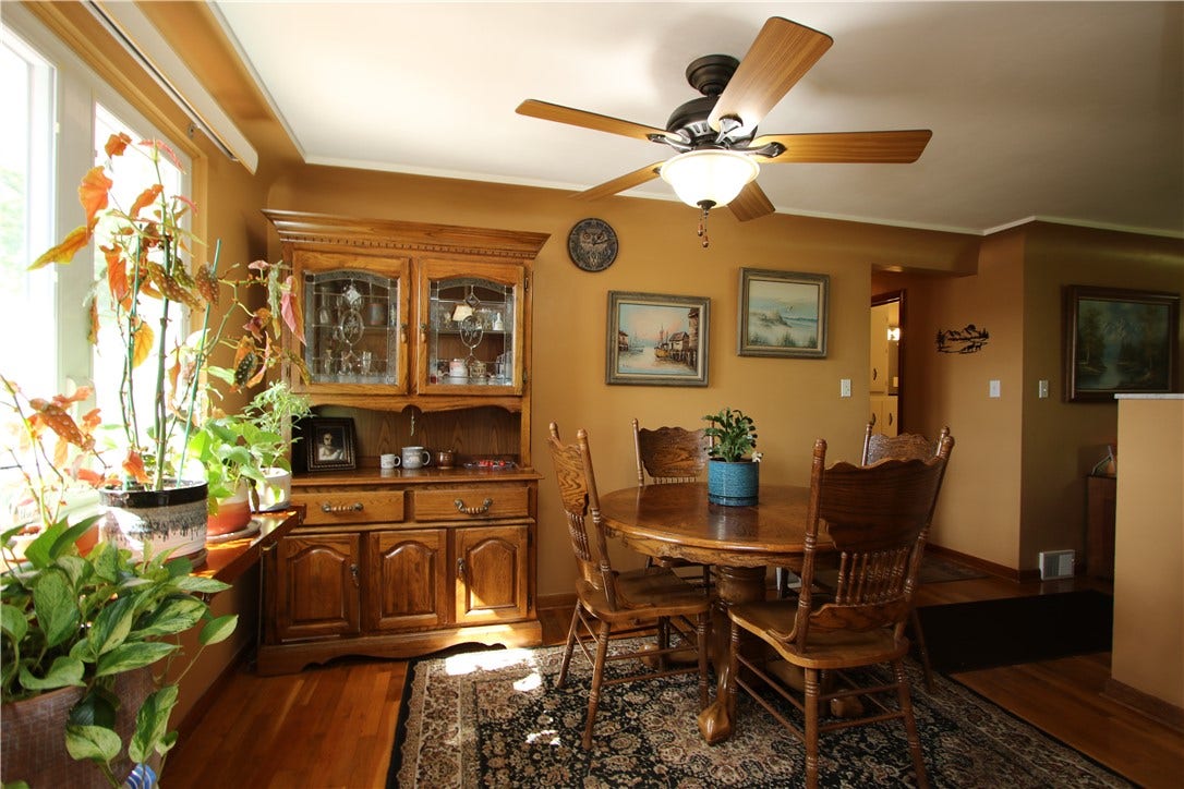 4239 Finleyville Elrama Road, Finleyville, PA 15332 Separate 11x9 Formal Dining Room also featuring Beautiful Original Hardwood Floors, Big Back Window allowing the Natural Light to flow throughout the home, Ceiling Fan Light Fixture & continued w/ Quality Plaster Walls & Distinctive Coved Ceilings