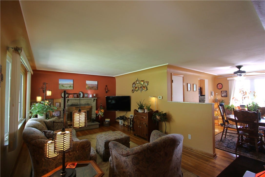 4239 Finleyville Elrama Road, Finleyville, PA 15332 Open Floor Plan from Living Room to Dining Room w/ Marble Top on 1/2 Wall separating rooms